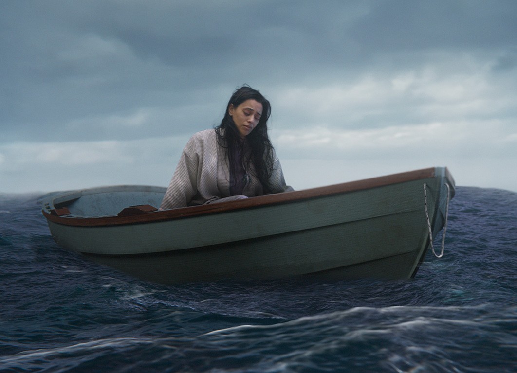 Woman in bedroom with baby
