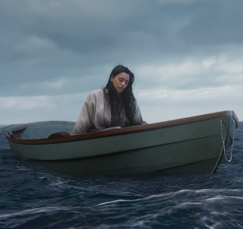 Woman in bedroom with baby