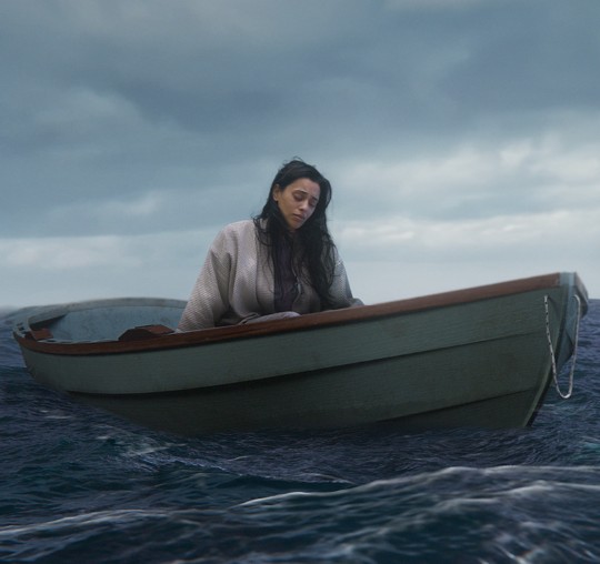 Woman in bedroom with baby