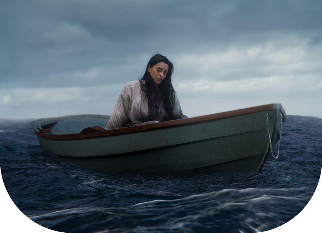 sad woman in boat